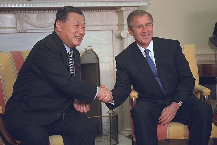 President Bush shakes hands with Prime Minister Yoshiro Mori during a meeting in the Oval Office. The leaders issued a joint statement.