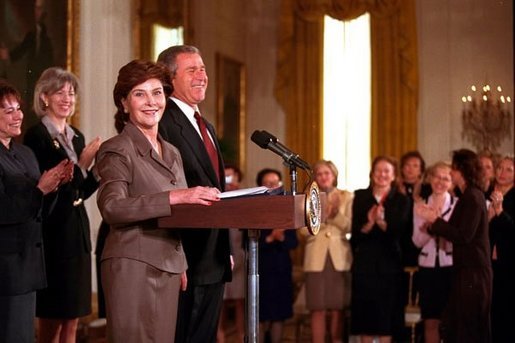 Laura Bush introduces President George W. Bush for his speech on Women Business Leaders in the East Room March 20, 2001. White House photo by Paul Morse.