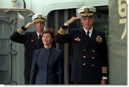 Laura Bush is welcomed aboard the USS Shiloh anchored in San Diego, Calif., for a Troops to Teachers event March 23, 2001.  White House photo by Paul Morse