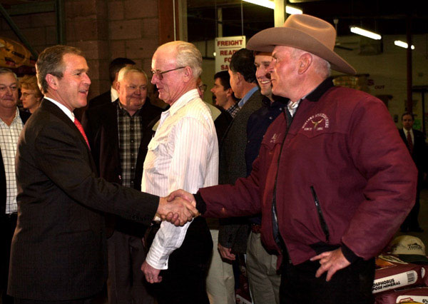 President George W. Bush greets farmers before a meeting with Montana Agricultural Producers at Tractor Supply Company in Billings, Montana, Monday, March 26, 2001. WHITE HOUSE PHOTO BY ERIC DRAPER