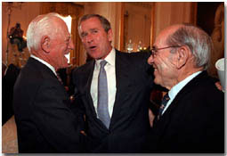 President George W. Bush chats with Hall of Famer’s Sparky Anderson, left, and Yogi Berra in a ceremony in the East Room of the White House on March 30, 2001.