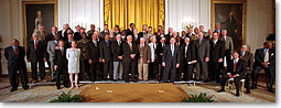 President George W. Bush poses with members of Baseball’s Hall of Fame during a ceremony in the East Room of the White House on Friday March 30, 2001. 