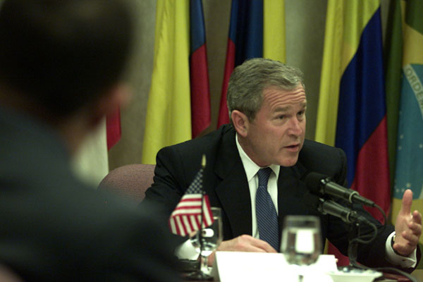 President Bush discusses trade and other issues at the Summit of the Americas in Quebec City, Canada.
