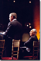 President George W. Bush speaks during the Jewish Committee dinner as Israeli Prime Minister Shimon Peres looks on Thursday night, May 3, in Washington, D.C. WHITE HOUSE PHOTO BY PAUL MORSE