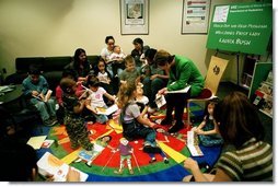 Laura Bush reads “The Very Hungry Caterpillar” to children in the Pediatric Unit of Chicago Hospital during a visit to promote Reach Out and Read Programs in Chicago, Illinois, May 14, 2001.  White House photo by Paul Morse