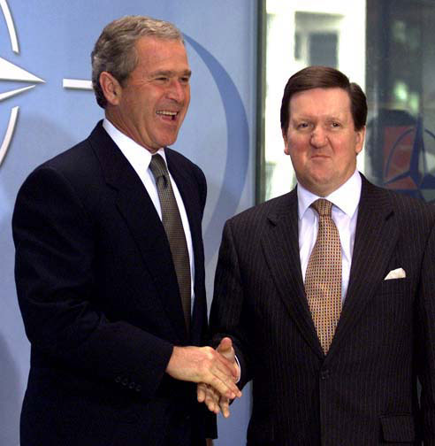 NATO Secretary-General George Robertson greets President George W. Bush at NATO headquarters in Brussels, Belgium on June 13, 2001. WHITE HOUSE PHOTO BY PAUL MORSE