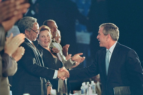 President George W. Bush shakes hands with a row of U.S. mayors including Philadelphia Mayor John F. Street after speaking at the 69th Conference of Mayors in Detroit, Michigan, Monday, June 25, 2001. WHITE HOUSE PHOTO BY ERIC DRAPER