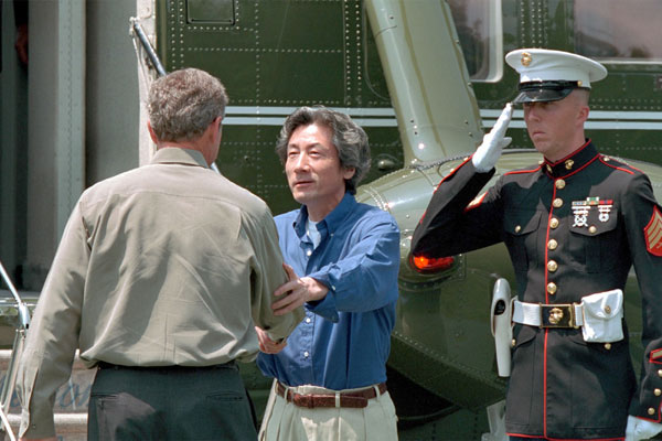 President Bush greets Prime Minister Koizumi of Japan at Camp David June 30, 2001