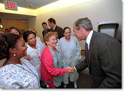 President Bush greets some of the staff and patients at Inova Fair Oaks Hospital July 3, 2001. The President and Mrs. Bush were at the hospital visiting Desiree and Stephen Sayle, who were celebrating the birth of their second daughter, Vivienne. White House photo by Eric Draper.