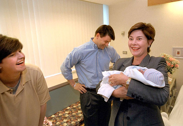 President Bush and First Lady Laura Bush visit Desiree and Stephen Sayle at Inova Fair Oaks Hospital July 3, 2001. Mrs. Sayle, who is the First Lady's Director of Correspondence, recently gave birth to her second daughter, Vivienne. White House photo by Eric Draper.