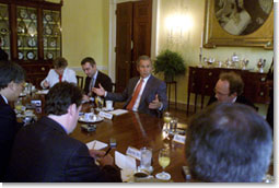 President Bush meets with a
roundtable of journalists from Europe at the Worldbank Headquarters in
Washington, D.C., July 17, 2001, to discuss his current trip there this
week. White House photo by Moreen Ishikawa.