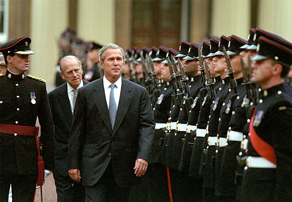 President reviews the guard during his visit to Buckingham Palace July 19, 2001. White House photo by Paul Morse.