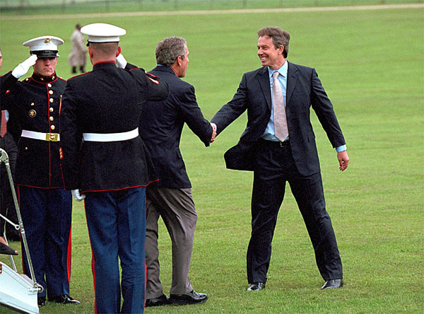 British Prime Minister Tony Blair welcomes President Bush to Chequers in Halton, England, July 19. Like Camp David, which Mr. Blair visited in February, Chequers is a private residence for the Prime Minister where the two leaders can talk privately. "I think it is yet another example of the strength of the relationship between our two countries. It is a very strong relationship, a very special one," said Mr. Blair during a press conference where he welcomed President Bush. White House photo by Eric Draper.