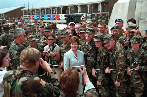 Laura Bush attends the Dedication of the Laura Bush Center for Education at Camp Bondsteel July 24, 2001 in Kosovo, Federal Republic of Yugoslavia. White House photo by Moreen Ishikawa.