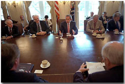 President Bush meets with members of Congress to discuss his recent tip to the Genoa G-8 Summit in the Cabinet Room at the White House July 25, 2001. White House photo by Eric Draper.