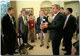 President Bush meets with Erik Weihenmeyer (far left), 32, of Golden, Colorado, and his friends to the Oval Office July 26, 2001. Mr. Weihenmeyer was the first blind person to reach the summit of Mount Everest May 25, 2001. After losing his sight to retinoscheses at the age of 13, he began rock climbing at the age of 16. White House photo by Paul Morse.