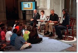 Librarian of Congress, James Billington, Mrs. Bush, Orlando Magic Grant Hill and LA Sparks Lisa Leslie participate in the National Book Festival Back to School event in the Great Hall at the Library of Congress Jefferson Building Sept. 7, 2001 in Washington, D.C.  White House photo by Moreen Ishikawa