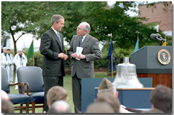 Stories were exchanged and as President Bush presented Australian Prime Minister Howard with the bell from the U.S.S. Canberra at a ceremony commemorating 50 years of military alliance. 'The President had received word of an exceptional action in battle by the Australian Navy, which were steaming alongside American vessels at Guadalcanal. His Majesty's Australian ship Canberra did not survive the battle, disappearing into the depths where she rests today,' explained the President. White House photo by Tina Hager.