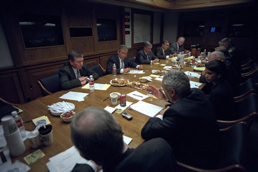 After addressing the nation, President George W. Bush meets with his National Security Council in the Presidential Emergency Operations Center Sept. 11, 2001. White House photo by Eric Draper