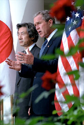 President Bush and Japanese Prime Minister make a joint statement pledging to support each other in the fight against global terrorism during press conference in the Rose Garden Sept. 25. White House photo by Tina Hager.