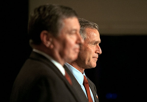 Introduced by Attorney General John Ashcroft, President George W. Bush addresses a group of new U. S. Attorneys at the Dwight D. Eisenhower Executive Office Building Nov. 29. "I want to congratulate you. I must tell you that we set a high standard, and you met it. And for that, I hope you're proud," said the President in his remarks. "And I am grateful that you are willing to serve the country, particularly at this time." White House photo by Paul Morse.