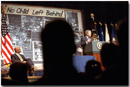 "The No Child Left Behind Act provides new training opportunities for teachers to develop their professional skills and their knowledge," said President George W. Bush during an education rally at the Daughters of the American Revolution (DAR) Constitution Hall in Washington, D.C., Jan. 9. On stage with President Bush is Secretary of Education Rod Paige (far left) and Congressmen Rep. George Miller, U.S. Sen. Edward Kennedy and Rep. John Boehner (none are pictured). White House photo by Tina Hager.