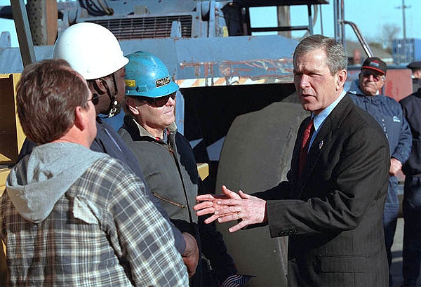 President George W. Bush talks with workers at the Port of New Orleans, Tuesday, Jan. 15, 2002. White House photo by Eric Draper.