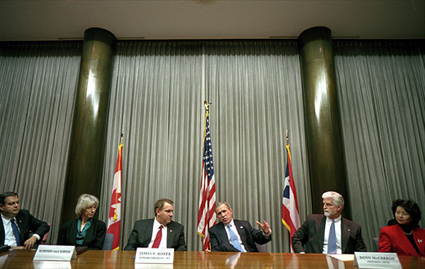President George W. Bush meets with labor leaders to discuss America's energy policy at the International Brotherhood of Teamsters headquarters in Washington, D.C., Jan. 17, 2001. From left to right, sitting with the President are Secretary of Energy Spencer Abraham, Secretary of the Interior Gale Norton, President of the Teamsters union James P. Hoffa, President of the United Brotherhood of Carpenters Doug McCarron and Secretary of Labor Elaine Chao. "Together we can show the country that when we work together, we can do what's right, do what's right for the working folks," said the President in his remarks. White House photo by Eric Draper.