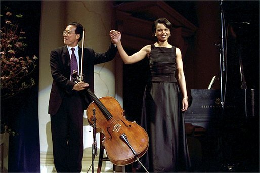 Cellist Yo-Yo Ma and National Security Advisor Dr. Condoleezza Rice take their bow after performing a duet to a Brahm's sonata at the presentation of awards by the National Endowment of the Arts and Humanities at Constitution Hall in Washington, DC , April 22. White House photo by Paul Morse.