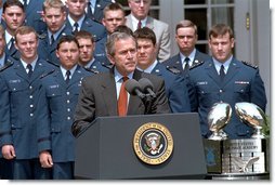 President George W. Bush speaks during the presentation of the Commander-in-Chief's Trophy to the Air Force Academy football team in the Rose Garden Friday, May 17. "During last May's visit, I said of Coach DeBerry, he is not just recruiting to win football games, he is recruiting to win our nation's war, if we have one. That was May. And on September 11th, war came to our country. And I want to thank you, Coach, for recruiting those who will help us win our nation's wars," remarked the President. White House photo by Tina Hager.