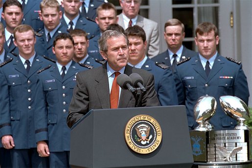 President George W. Bush speaks during the presentation of the Commander-in-Chief's Trophy to the Air Force Academy football team in the Rose Garden Friday, May 17. "During last May's visit, I said of Coach DeBerry, he is not just recruiting to win football games, he is recruiting to win our nation's war, if we have one. That was May. And on September 11th, war came to our country. And I want to thank you, Coach, for recruiting those who will help us win our nation's wars," remarked the President. 
