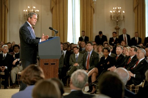 President George W. Bush announces an initiative for a new Cuba Policy in the East Room Monday, May 20. "If Cuba's government takes all the necessary steps to ensure that the 2003 elections are certifiably free and fair -- certifiably free and fair -- and if Cuba also begins to adopt meaningful market-based reforms, then -- and only then -- I will work with the United States Congress to ease the ban on trade and travel between our two countries," said the President. White House photo by Tina Hager