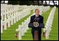 President George W. Bush gives a Memorial Day speech at the Normandy American Cemetery at Normandy Beach in France on May 27, 2002. White House photo by Paul Morse