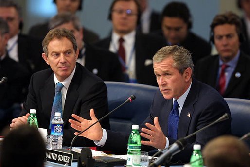 President George W. Bush address world leaders with British Prime Minister Tony Blair next to him during the meeting of the NATO-Russia Council at Practica di Mare Air Force base near Rome, Italy on May 28, 2002. President George W. Bush address world leaders with British Prime Minister Tony Blair next to him during the meeting of the NATO-Russia Council at Practica di Mare Air Force base near Rome, Italy on May 28, 2002.