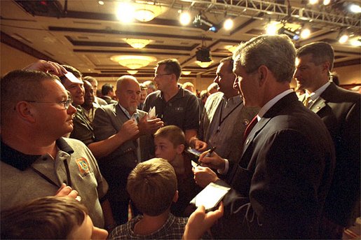 President George W. Bush meets with the delegates and their families during his visit to the United Brotherhood of Carpenters and Joiners of America 2002 Legislative Conference in Washington, D.C., Wednesday, June 19. 