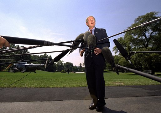 President George W. Bush speaks to the media before departing the White House Friday afternoon, August 2, 2002. White House photo by Eric Draper.