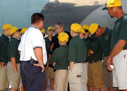 President George W. Bush greets players and coaches from the Valley Sports American Little League, this year’s Little League World Series Champions, upon arrival at Louisville International Stanford Field Airport in Kentucky Thursday, September 5, 2002. 