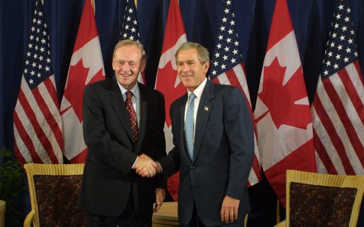 President George W. Bush and Canadian Prime Minister Jean Chretien address the media before their bilateral meeting in Detroit Monday, September 9. White House photo by Paul Morse.