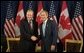 President George W. Bush and Canadian Prime Minister Jean Chretien address the media before their bilateral meeting in Detroit Monday, September 9. White House photo by Paul Morse.