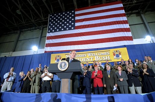 President George W. Bush addresses service personnel and guests at the Army National Guard Aviation Support Facility in Trenton, New Jersey, Monday, Sept. 23. 