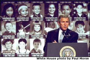 President George W. Bush addresses participants in the first-ever White House Conference on Missing, Exploited, and Runaway Children Wednesday, October 2,2002 at the Ronald Reagan Building and International Conference Center in Washington, D.C. The event helped raise public awareness of steps that parents, law enforcement, and communities can take to make America\'s children safer. White House photo by Paul Morse. None
