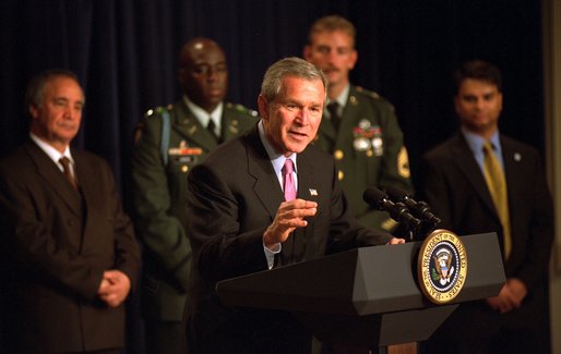 President George W. Bush highlights humanitarian efforts in Afghanistan during remarks about U.S. Humanitarian Aid to Afghanistan, Friday, October 11, 2002 at the Presidential Hall in the Eisenhower Executive Office Building. White House photo by Tina Hager.