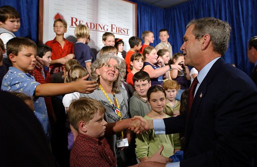 President George W. Bush greets students and teachers after delivering remarks on education at Read-Patillo Elementary School in New Smyrna Beach, Fla., Thursday, Oct. 17. White House photo by Eric Draper. White House photo by Eric Draper.