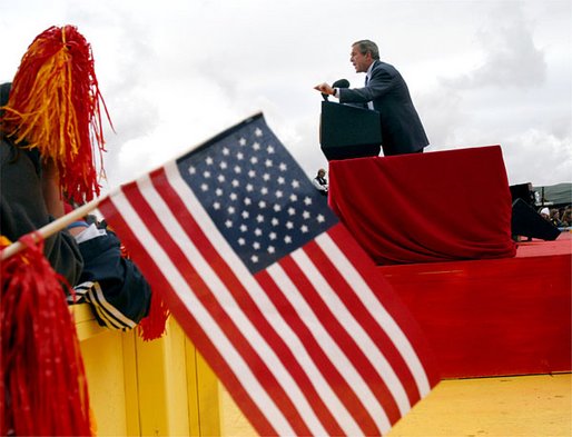 President George W. Bush addresses the audience during the New Mexico Welcome at Riner Steinhoff Soccer Complex in Alamogordo, N.M., Oct. 28, 2002. 