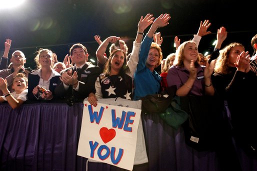 The audience reacts during the introduction of President George W. Bush during the Atlanta, Georgia Welcome at the Cobb Galleria Centre, Saturday, Nov. 2, 2002. White House photo by Eric Draper.