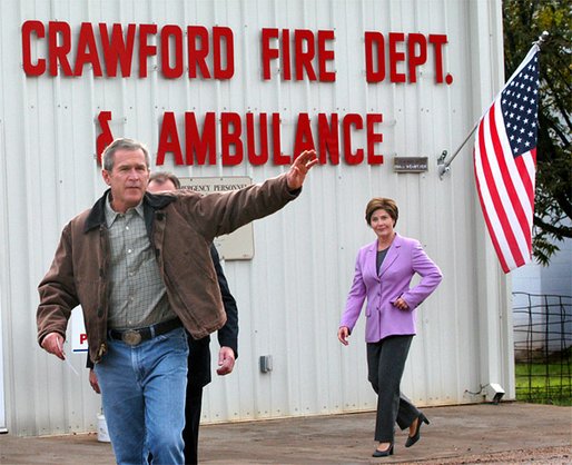 President George W. Bush and Laura Bush leave the Crawford Firehouse after voting in Crawford, Texas, Tuesday, Nov. 5. White House photo by Eric Draper