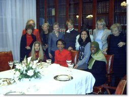 National Security Advisor Condoleeza Rice takes a group photo at the Karamah Iftaar Dinner. 