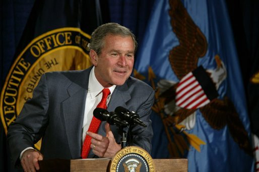 President George W. Bush talks with the employees of National Capital Flag Company in Alexandria. Va., about his Growth and Jobs Package, Thursday, Jan. 9, 2003. "This is a plan to encourage growth, focusing on jobs. And the Council of Economic Advisors has predicted that these proposals will create 2.1 million new jobs over the next three years. That's good for the American people. It's good for our economy, " President Bush said after his tour of the company. White House photo by Paul Morse