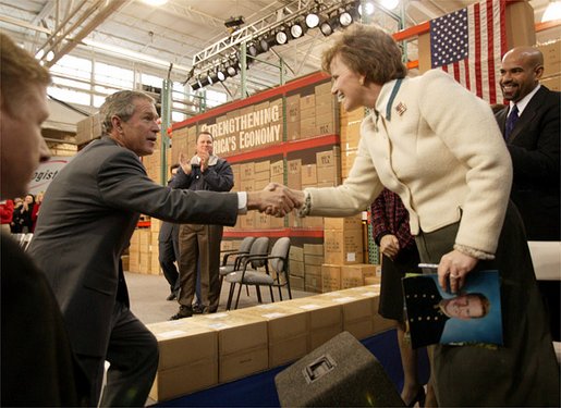 President George W. Bush greets employees at JS Logistics in St. Louis, Mo., after discussing his economic stimulus package Wednesday, Jan. 22, 2003. "It's important for our fellow Americans to understand that the strength of our country, the strength of our economy really depends upon the strength of the small business community all across America. And that's why I'm here today in this small business, to remind people about the importance of small business," President Bush said. White House photo by Paul Morse