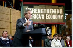 President George W. Bush talks with owners and employees of JS Logistics in St. Louis, Mo., about his economic stimulus package Wednesday, Jan. 22, 2003.  White House photo by Paul Morse